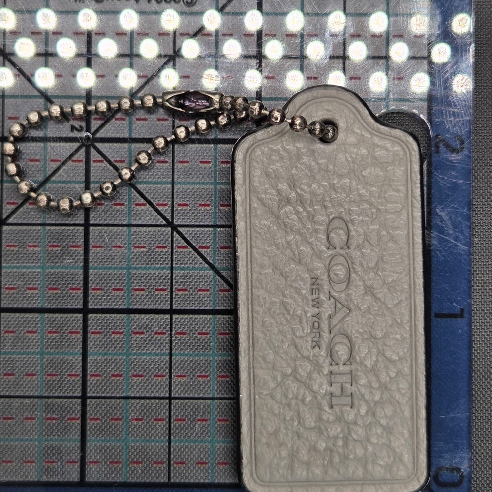 Coach Silver Leather Bag Tag